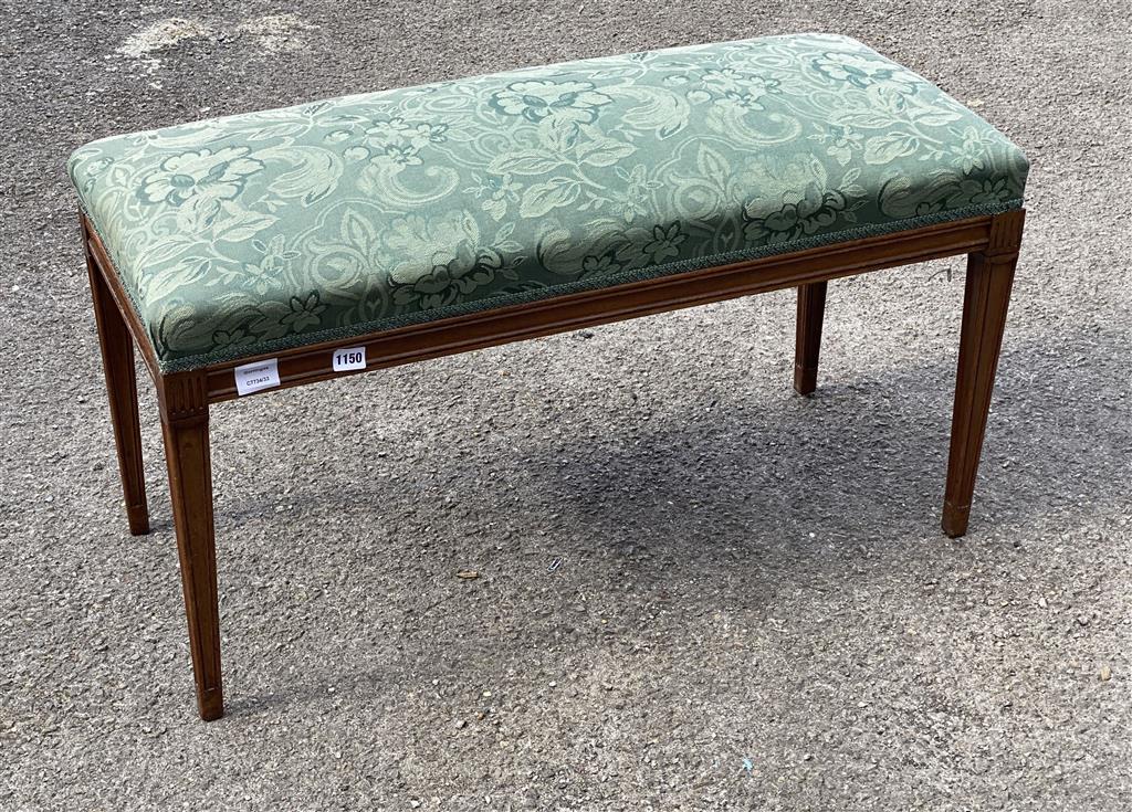 A George III style dressing stool, with blue floral brocade upholstery, length 90cm, depth 40cm, height 49cm